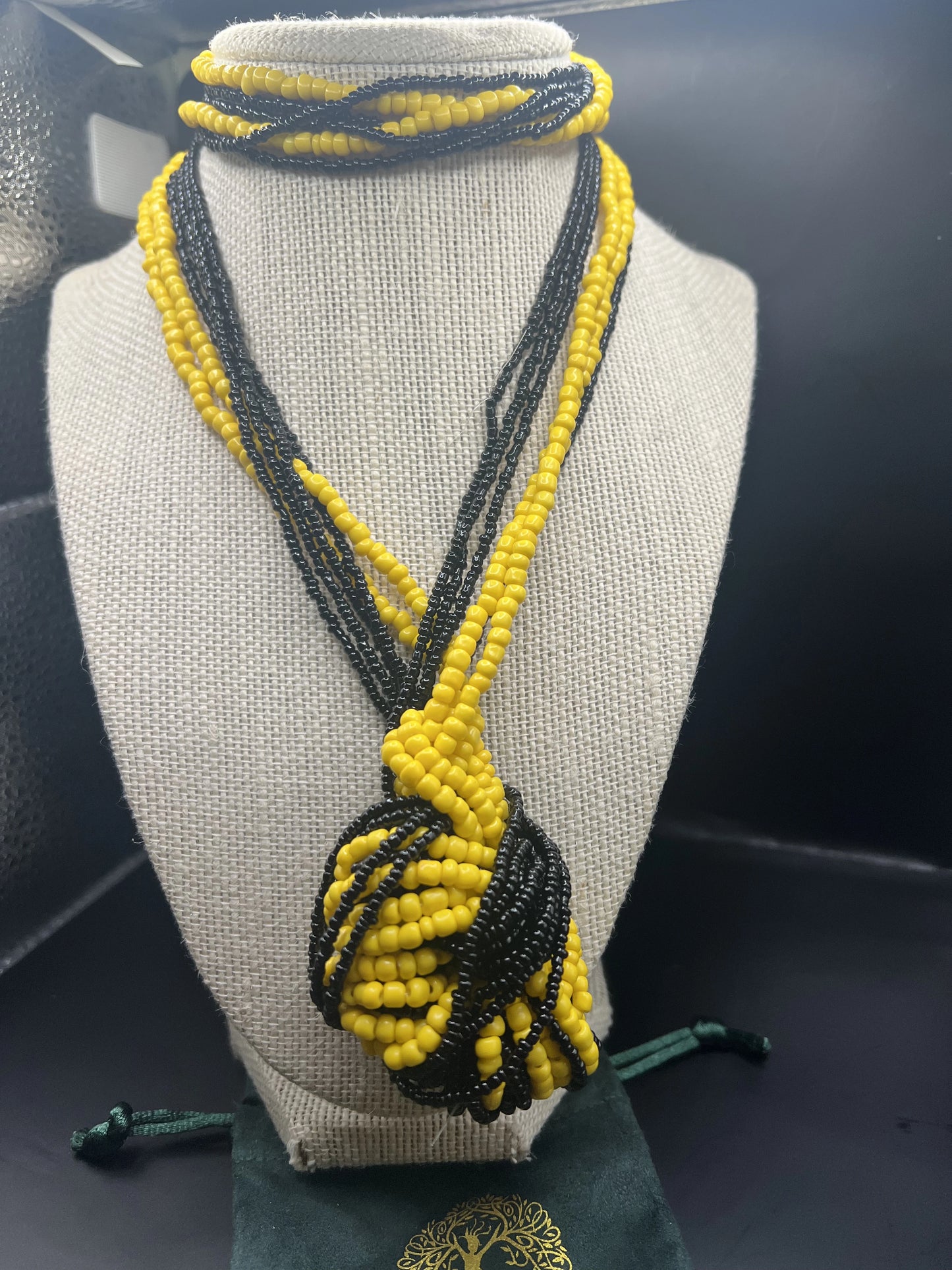 28 inch black and yellow beaded necklace.