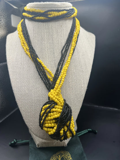 28 inch black and yellow beaded necklace.