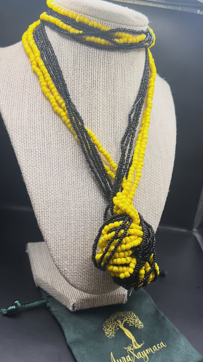 28 inch black and yellow beaded necklace.
